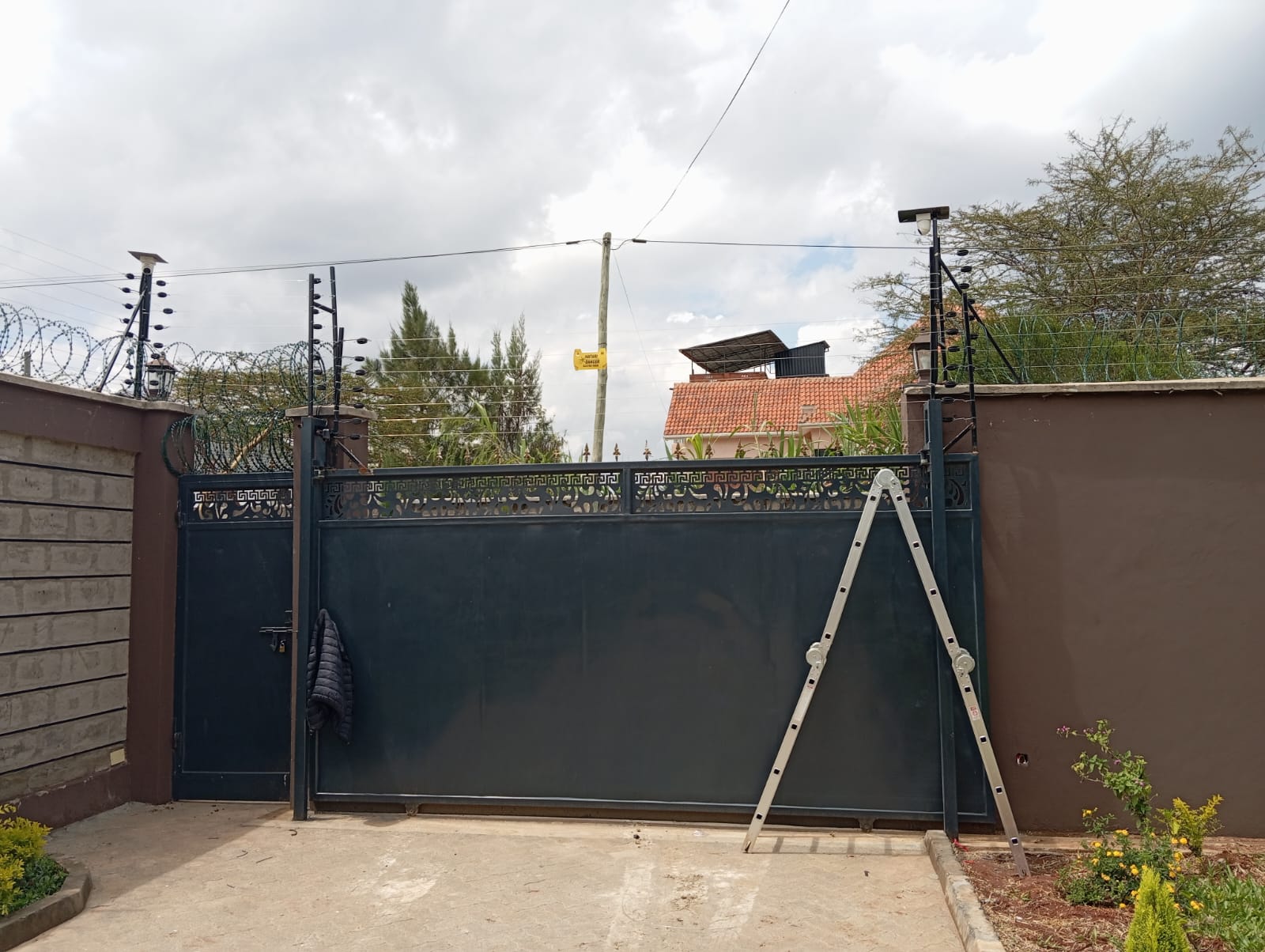 Electric fence and CCTV camera installed on perimeter gate